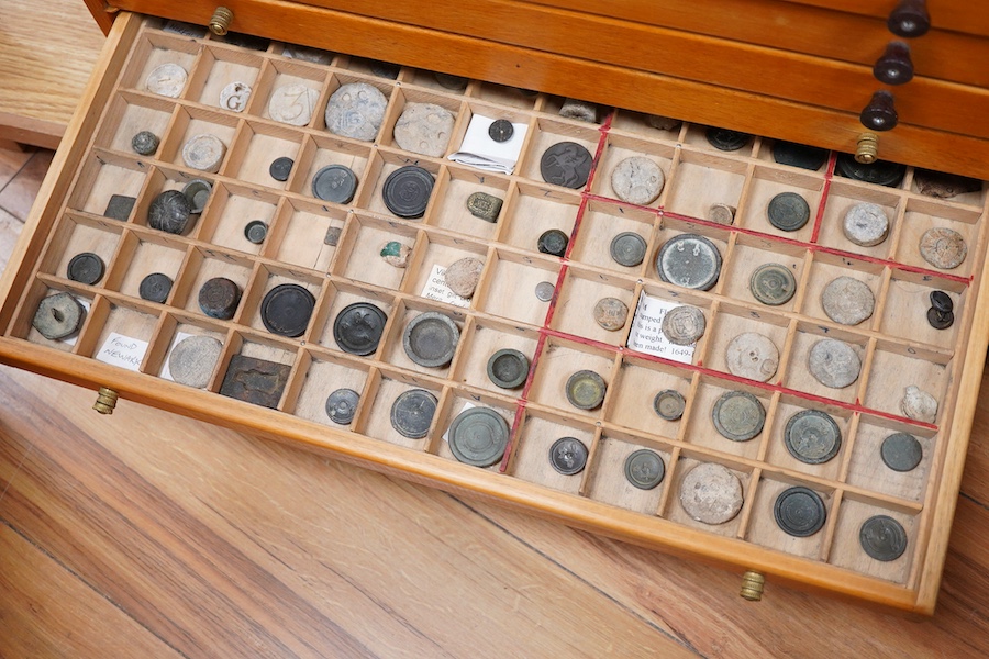 A collection of mainly Medieval to 19th century bronze and lead imperial circular trade weights, with some Viking and Roman examples, stamped with Royal Cyphers, weights, the dagger assay mark for London, the ewer mark,